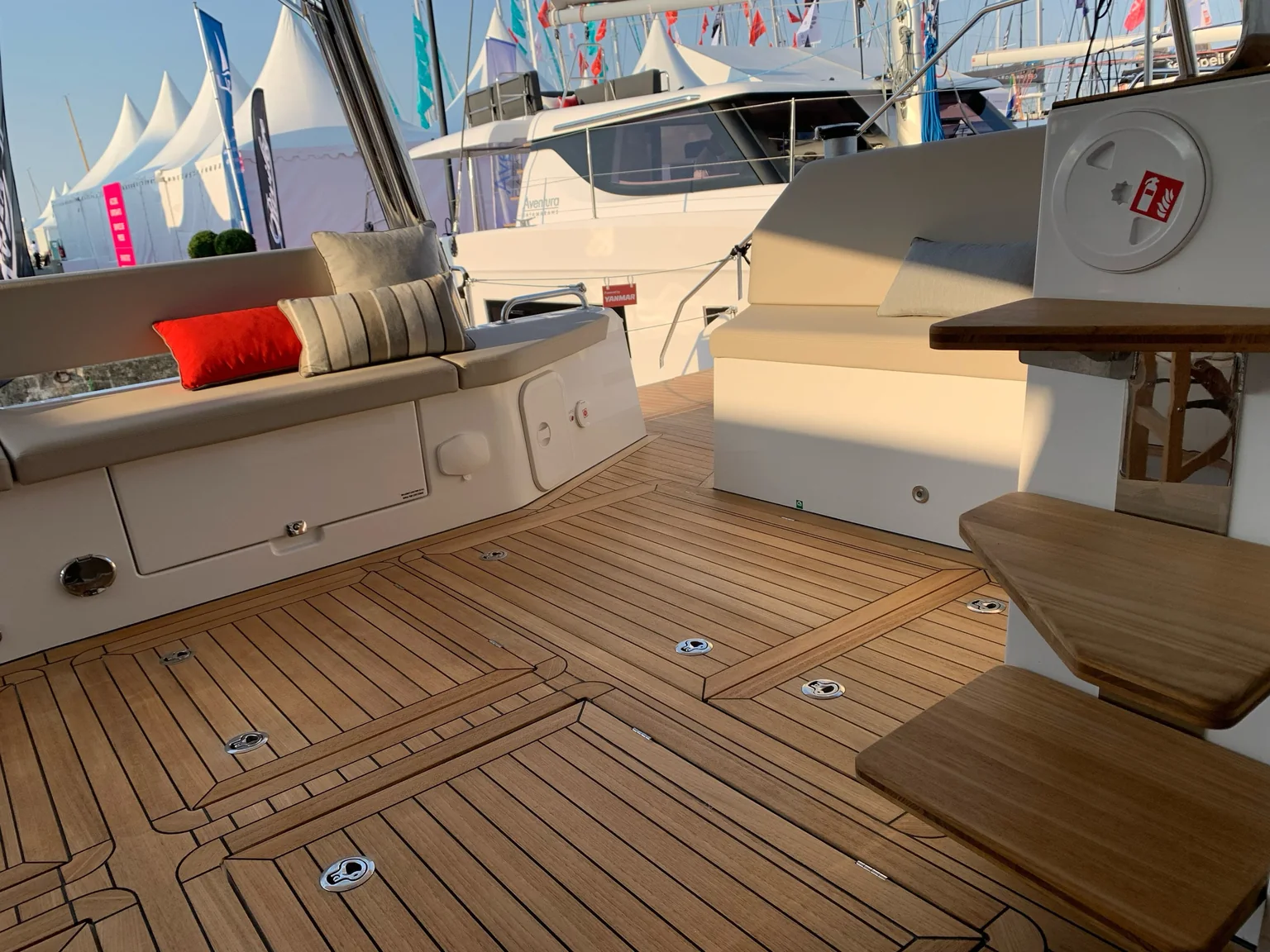 Aft deck seating and teak cockpit aboard ANURA