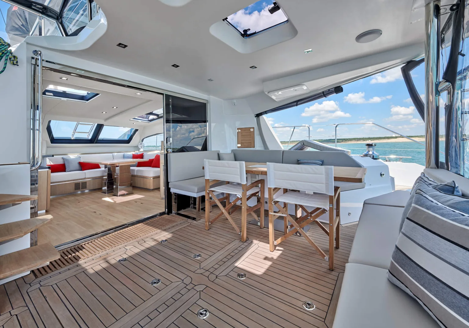 Open-air cockpit dining and lounge aboard ANURA