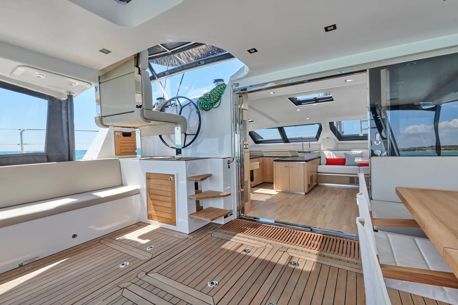 Teak deck and salon entrance aboard ANURA